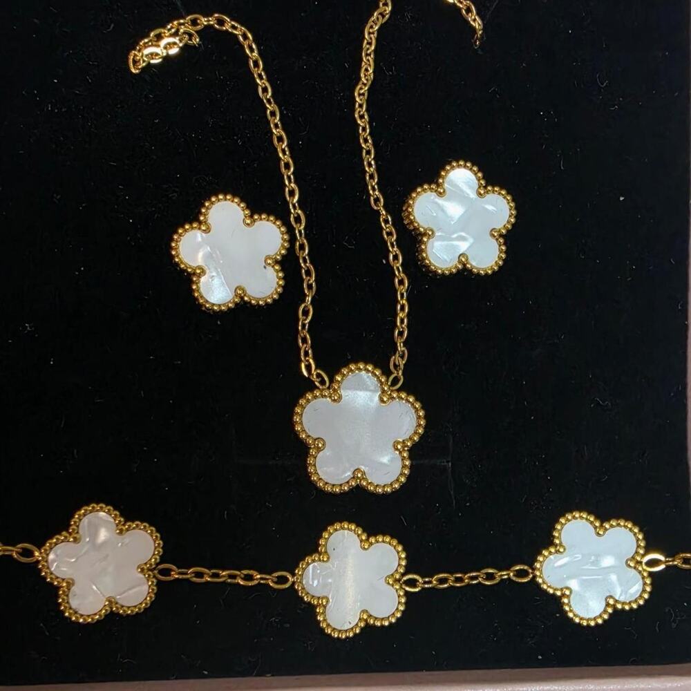 Gold tone mother of pearl